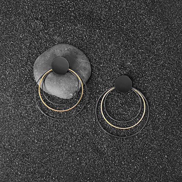 Black hoops with a splash of gold